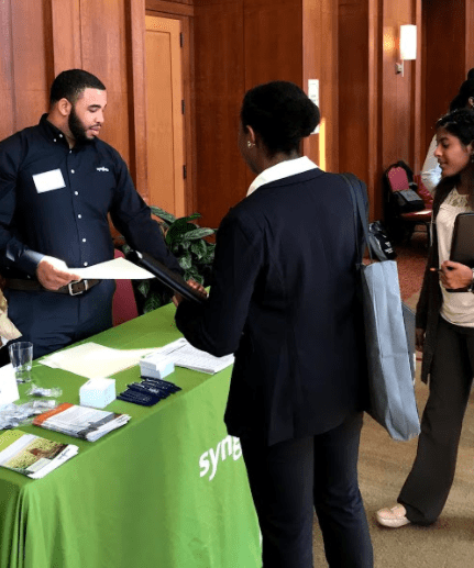 Student Engaging with Employer at Herbert College career fair
